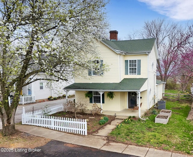 206 E Madison St, La Grange, KY 40031 - traditional-style home with a chimney, covered porch, cooling unit, a shingled roof, and concrete driveway