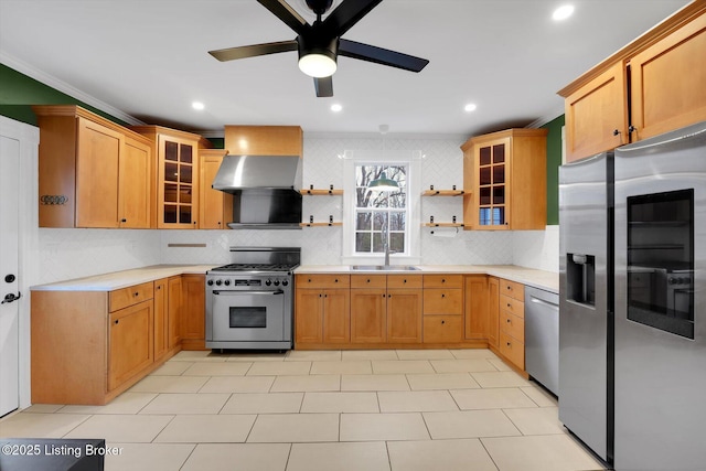 206 E Madison St, La Grange, KY 40031 - kitchen with appliances with stainless steel finishes, crown molding, wall chimney range hood, a ceiling fan, and light countertops