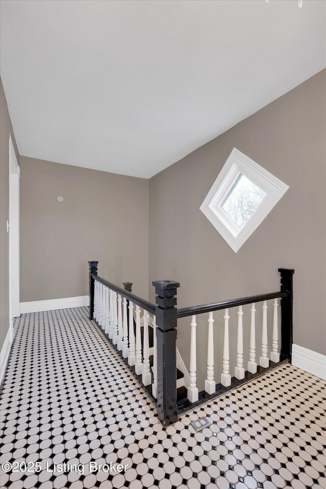 206 E Madison St, La Grange, KY 40031 - stairway with baseboards and a skylight