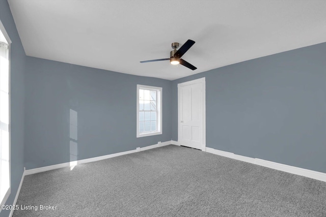 206 E Madison St, La Grange, KY 40031 - carpeted spare room with ceiling fan and baseboards