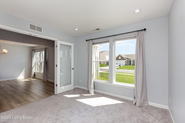 112 Shadow Rock Ct, Shepherdsville, KY 40165 - spare room with baseboards, visible vents, and carpet