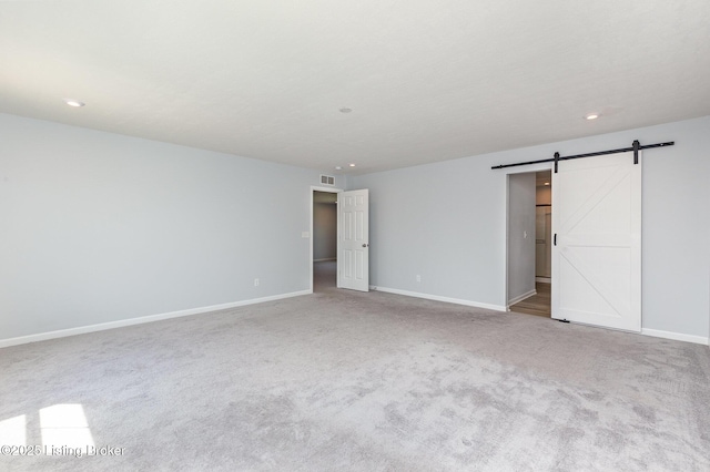 112 Shadow Rock Ct, Shepherdsville, KY 40165 - unfurnished bedroom with carpet, a barn door, recessed lighting, and baseboards