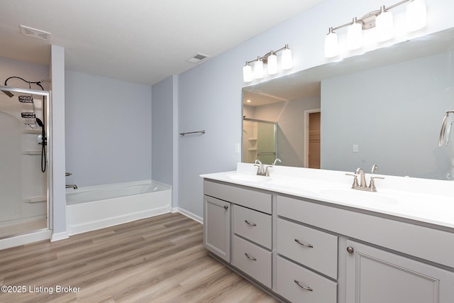 112 Shadow Rock Ct, Shepherdsville, KY 40165 - full bath featuring visible vents, a stall shower, wood finished floors, and a sink