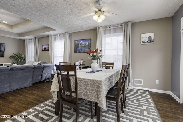 216 Willow Creek Dr, Mt Washington, KY 40047 - dining room with dark wood-type flooring, visible vents, plenty of natural light, and baseboards