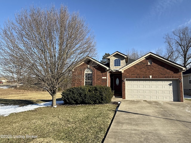 216 Willow Creek Dr, Mt Washington, KY 40047 - traditional home featuring a front lawn, driveway, an attached garage, and brick siding
