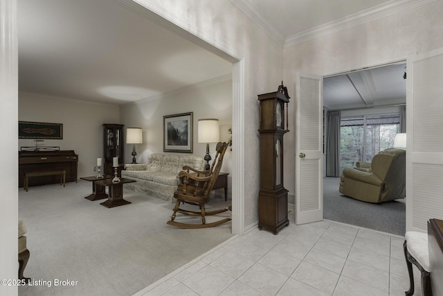carpeted living room with tile patterned floors, ornamental molding, and baseboards