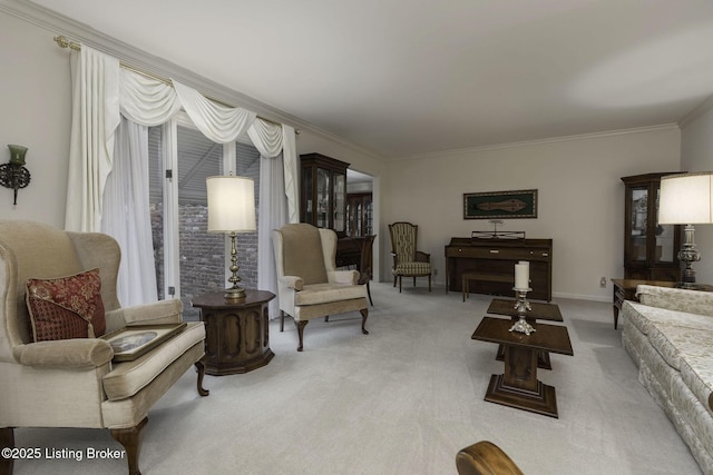 carpeted living room with crown molding and baseboards