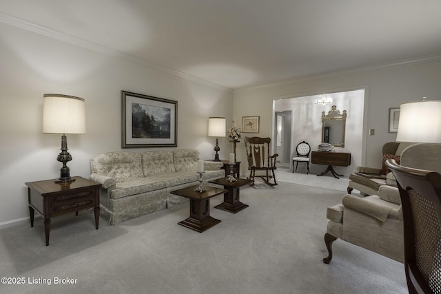 living room featuring a notable chandelier, light colored carpet, ornamental molding, and baseboards