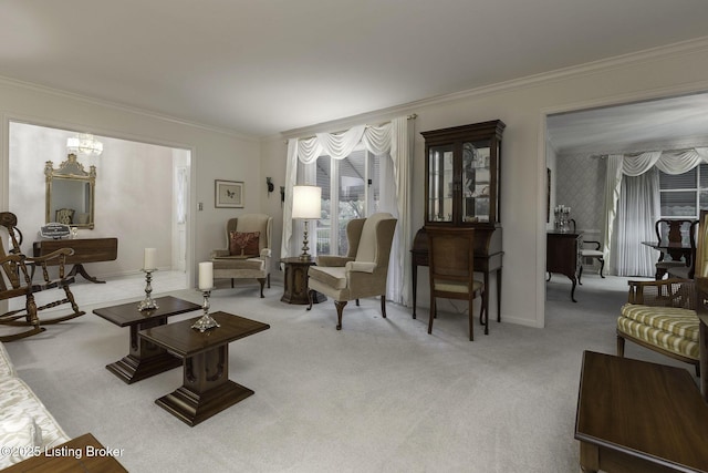 living room featuring crown molding, baseboards, and light colored carpet