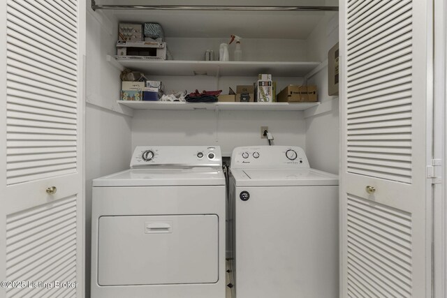 washroom featuring laundry area and washer and clothes dryer