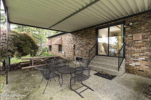 view of patio featuring outdoor dining area