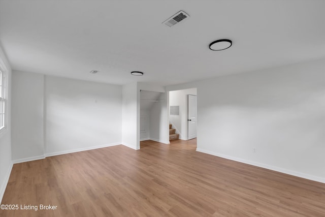 2311 Langdon Dr, Louisville, KY 40242 - unfurnished room featuring visible vents, baseboards, and light wood-type flooring