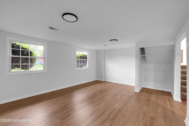 2311 Langdon Dr, Louisville, KY 40242 - unfurnished bedroom featuring baseboards, visible vents, wood finished floors, and a closet