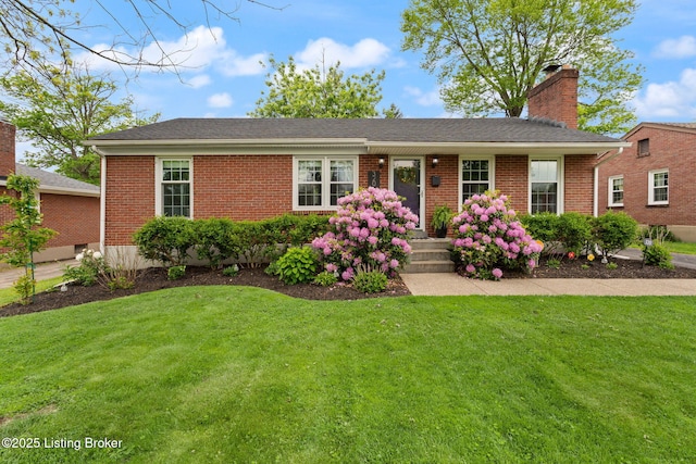 320 Biltmore Rd, Louisville, KY 40207 - ranch-style house with a front lawn, a chimney, and brick siding