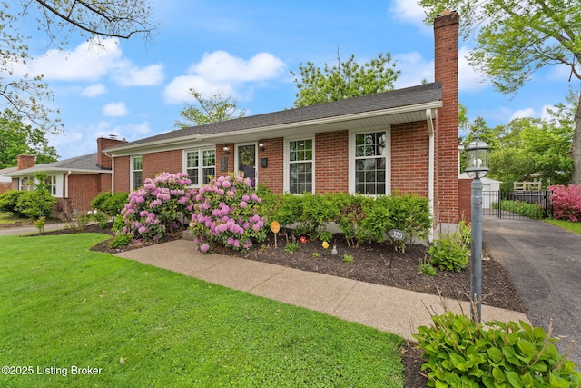 320 Biltmore Rd, Louisville, KY 40207 - single story home featuring brick siding, a chimney, and a gate