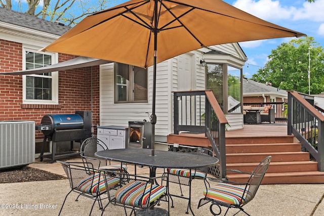 320 Biltmore Rd, Louisville, KY 40207 - view of patio / terrace with central AC unit, outdoor dining space, a grill, and a wooden deck
