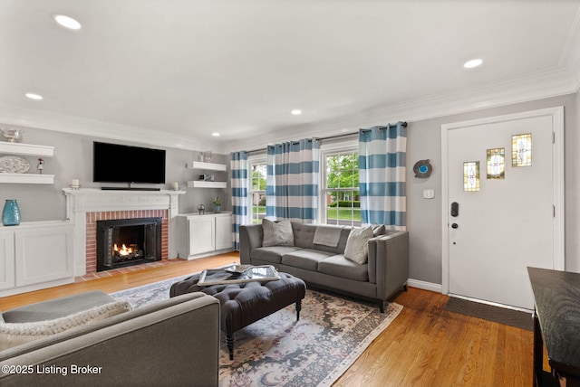 320 Biltmore Rd, Louisville, KY 40207 - living room featuring ornamental molding, wood finished floors, a fireplace, and recessed lighting