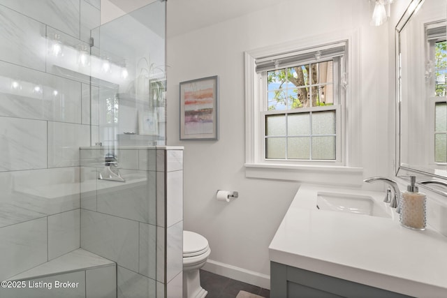 320 Biltmore Rd, Louisville, KY 40207 - bathroom with baseboards, a stall shower, toilet, and vanity