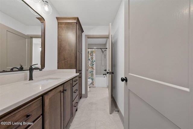 full bath featuring tile patterned flooring, vanity, baseboards, toilet, and shower / bathtub combination with curtain