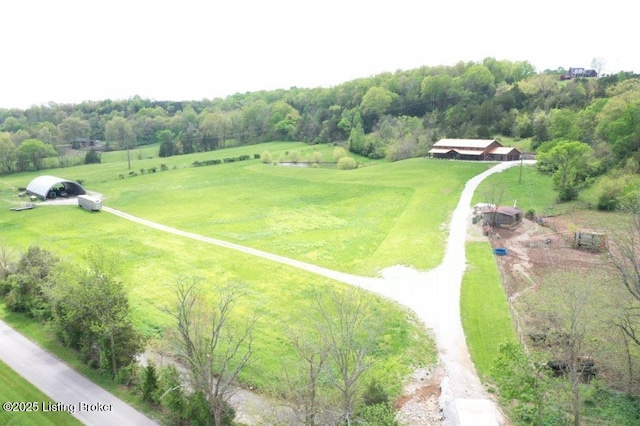birds eye view of property featuring a rural view