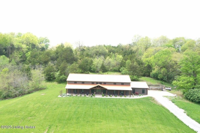 bird's eye view with a view of trees