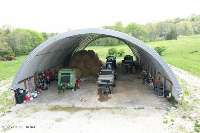 view of vehicle parking featuring a detached carport