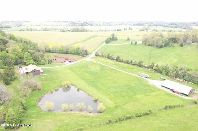 bird's eye view featuring a rural view and a water view