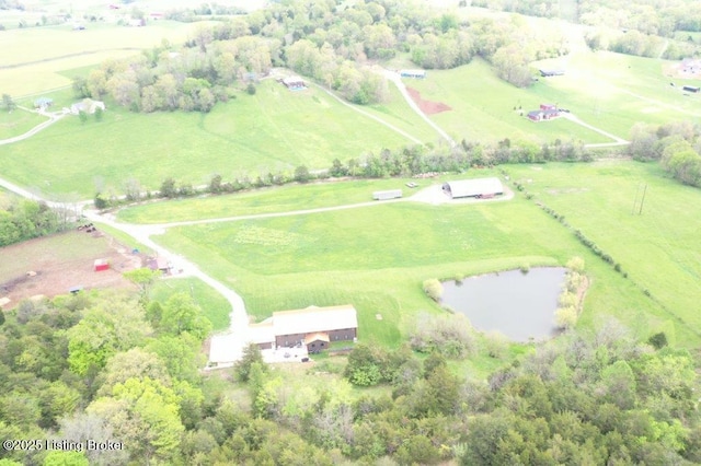 drone / aerial view with a rural view and a water view