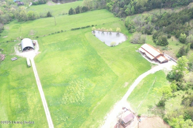 aerial view with a rural view and a water view
