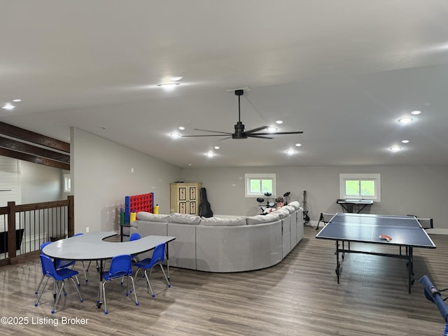 living room with a ceiling fan, wood finished floors, a wealth of natural light, and recessed lighting