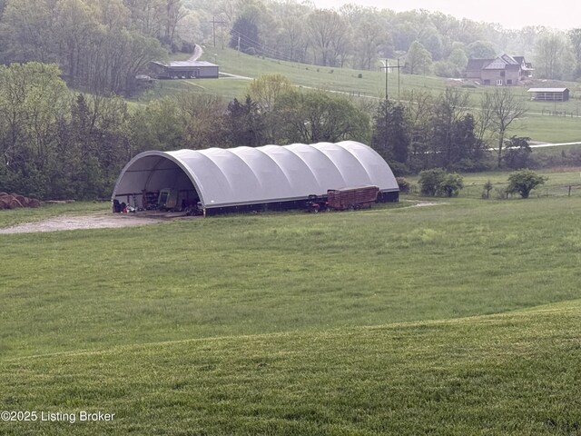 exterior space with a rural view
