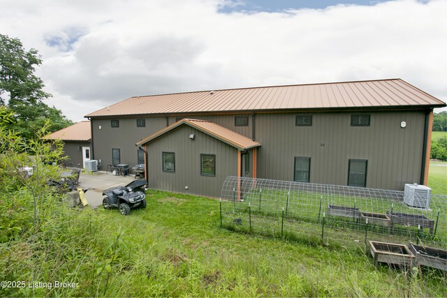 501 Shumate Ln, Bardstown, KY 40004 - back of house with central AC unit, metal roof, and a yard