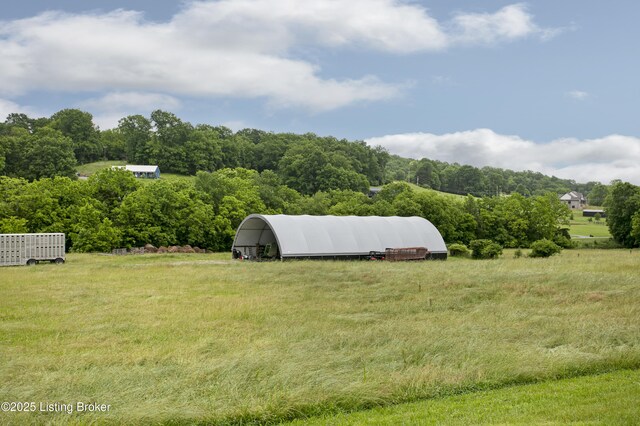 501 Shumate Ln, Bardstown, KY 40004 - view of yard featuring a detached carport and a forest view