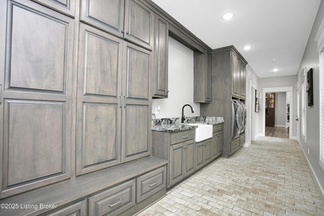 501 Shumate Ln, Bardstown, KY 40004 - kitchen featuring a sink, baseboards, brick patterned floors, recessed lighting, and light stone countertops