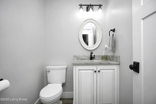 501 Shumate Ln, Bardstown, KY 40004 - bathroom with toilet, vanity, and baseboards