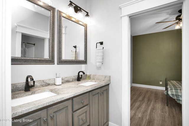 501 Shumate Ln, Bardstown, KY 40004 - bathroom with wood finished floors, double vanity, ceiling fan, and baseboards