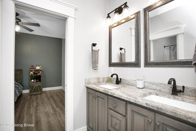 501 Shumate Ln, Bardstown, KY 40004 - full bath with double vanity, wood finished floors, ceiling fan, and baseboards