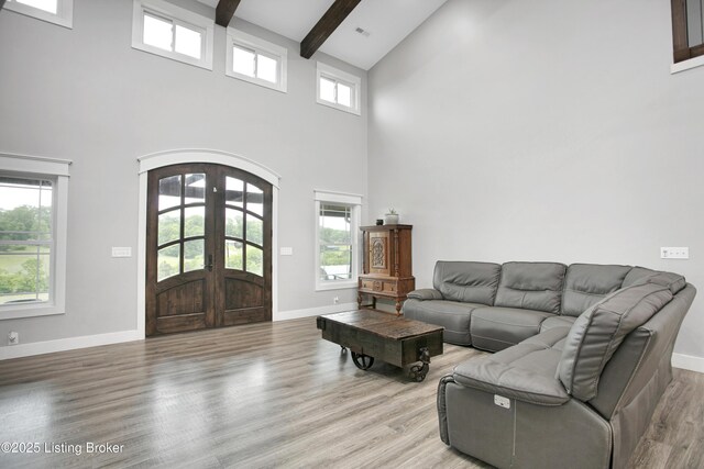 501 Shumate Ln, Bardstown, KY 40004 - living room featuring french doors, high vaulted ceiling, beam ceiling, wood finished floors, and baseboards