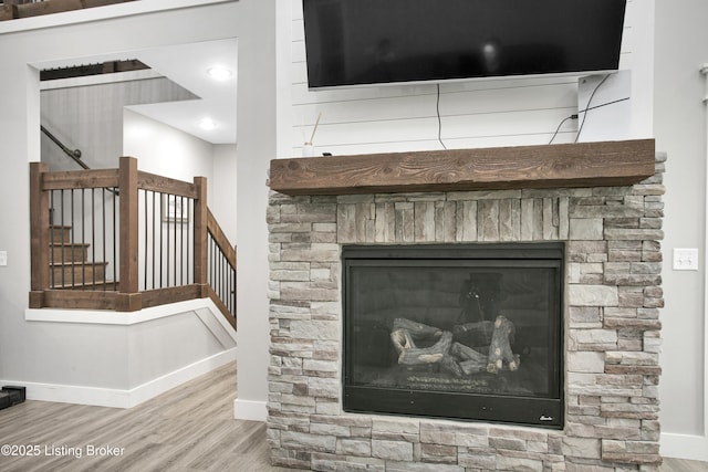 501 Shumate Ln, Bardstown, KY 40004 - detailed view of baseboards, wood finished floors, and a stone fireplace