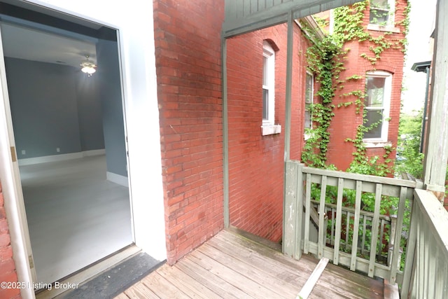 property entrance featuring brick siding