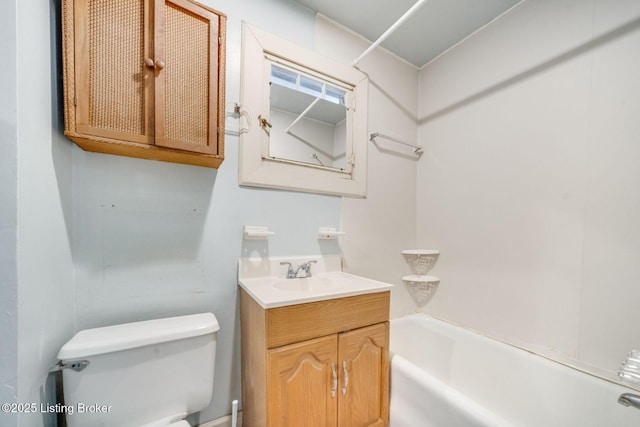 full bath with toilet, vanity, and  shower combination