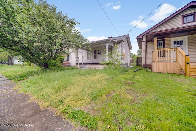 view of yard featuring a porch