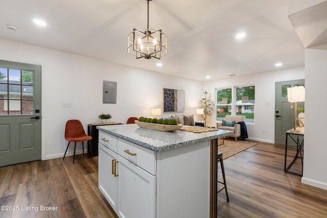 kitchen featuring recessed lighting, white cabinetry, and plenty of natural light