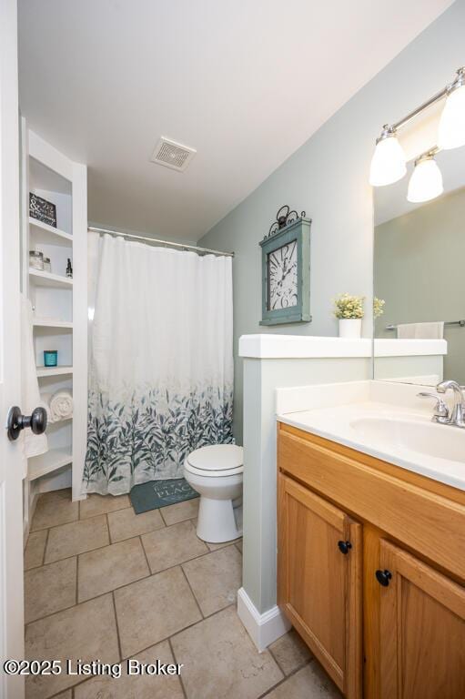 full bathroom with tile patterned flooring, a shower with curtain, toilet, vanity, and visible vents