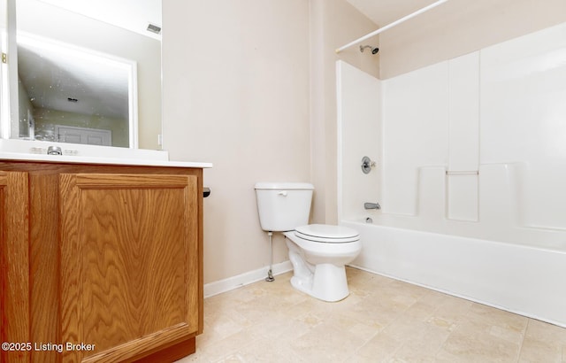 bathroom featuring toilet, baseboards, tub / shower combination, and vanity