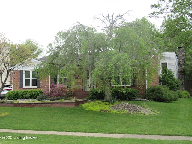 11802 Running Creek Rd, Douglass Hills, KY 40243 - view of front of home featuring brick siding and a front lawn