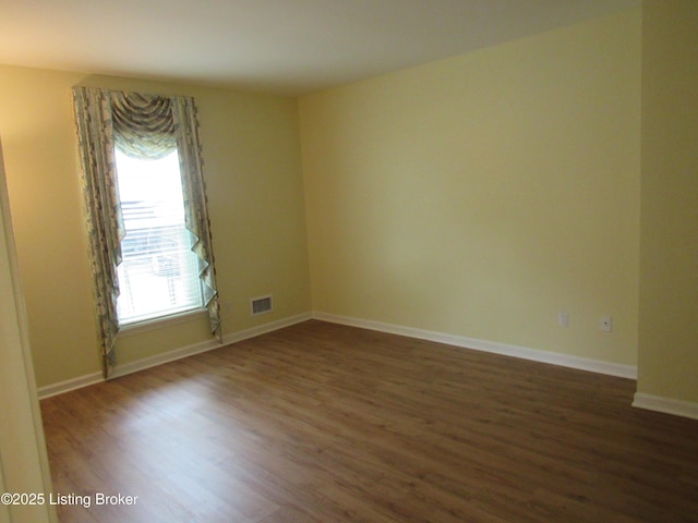 11802 Running Creek Rd, Douglass Hills, KY 40243 - unfurnished room featuring wood finished floors and baseboards