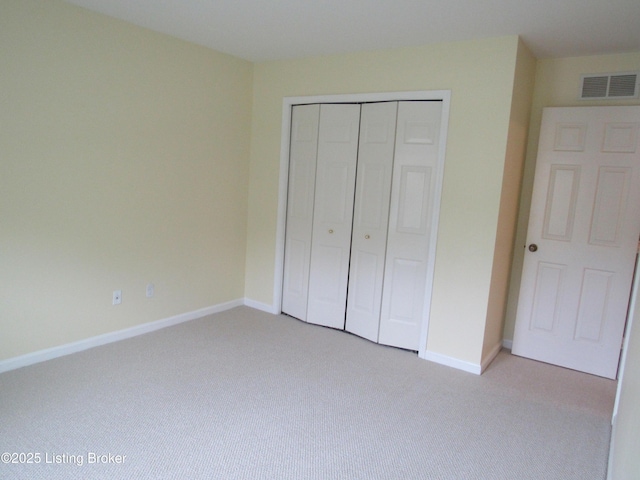 11802 Running Creek Rd, Douglass Hills, KY 40243 - unfurnished bedroom with light colored carpet, a closet, and baseboards