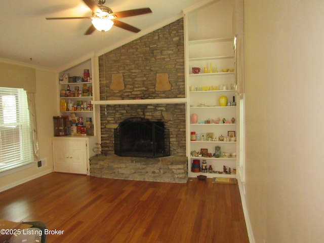 11802 Running Creek Rd, Douglass Hills, KY 40243 - living area with wood finished floors, ceiling fan, crown molding, lofted ceiling, and a stone fireplace