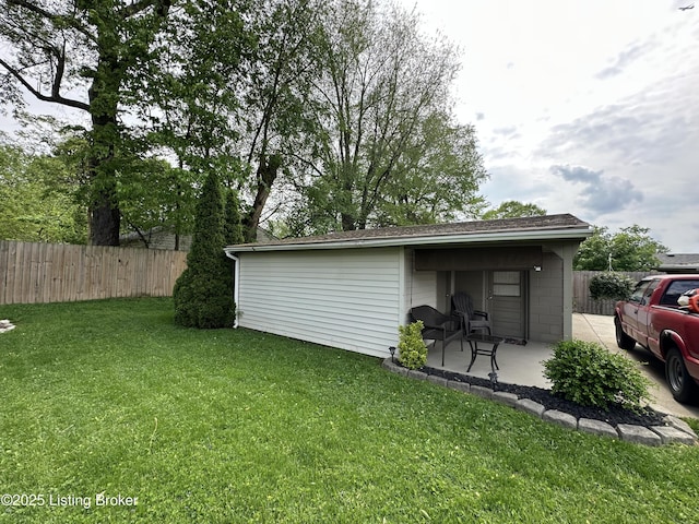 view of yard featuring a patio area and fence